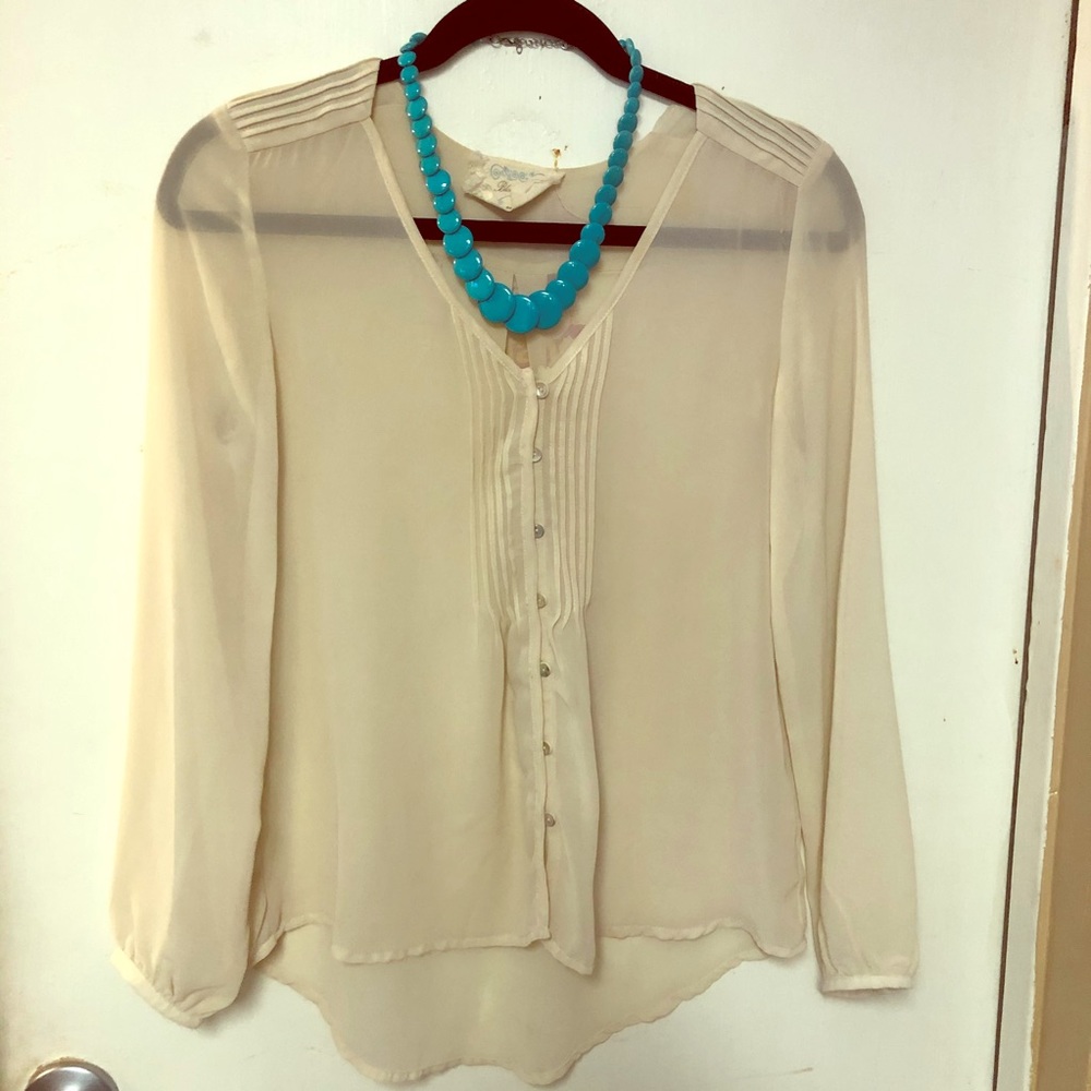 Long sleeve, cream see through blouse, size S.